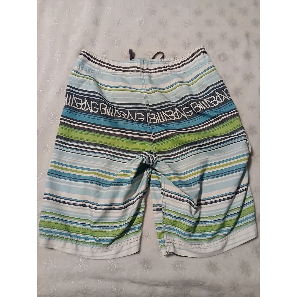 Billabong Board Shorts Size 30 with an attached fire starter and bottle opener